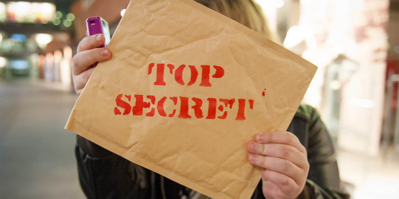 An envelope that says 'top secret on it'