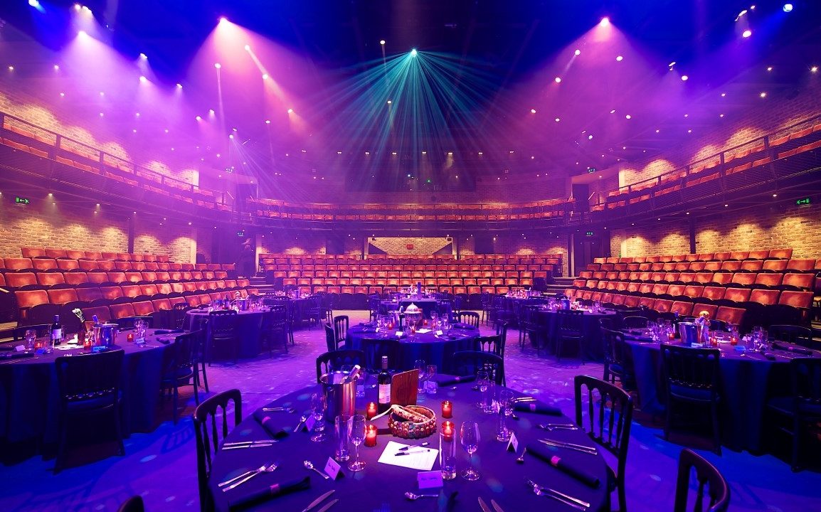 The Everyman auditorium set up for dining on stage.