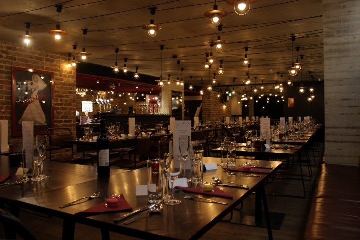 A dining table set up Downstairs at the Everyman.