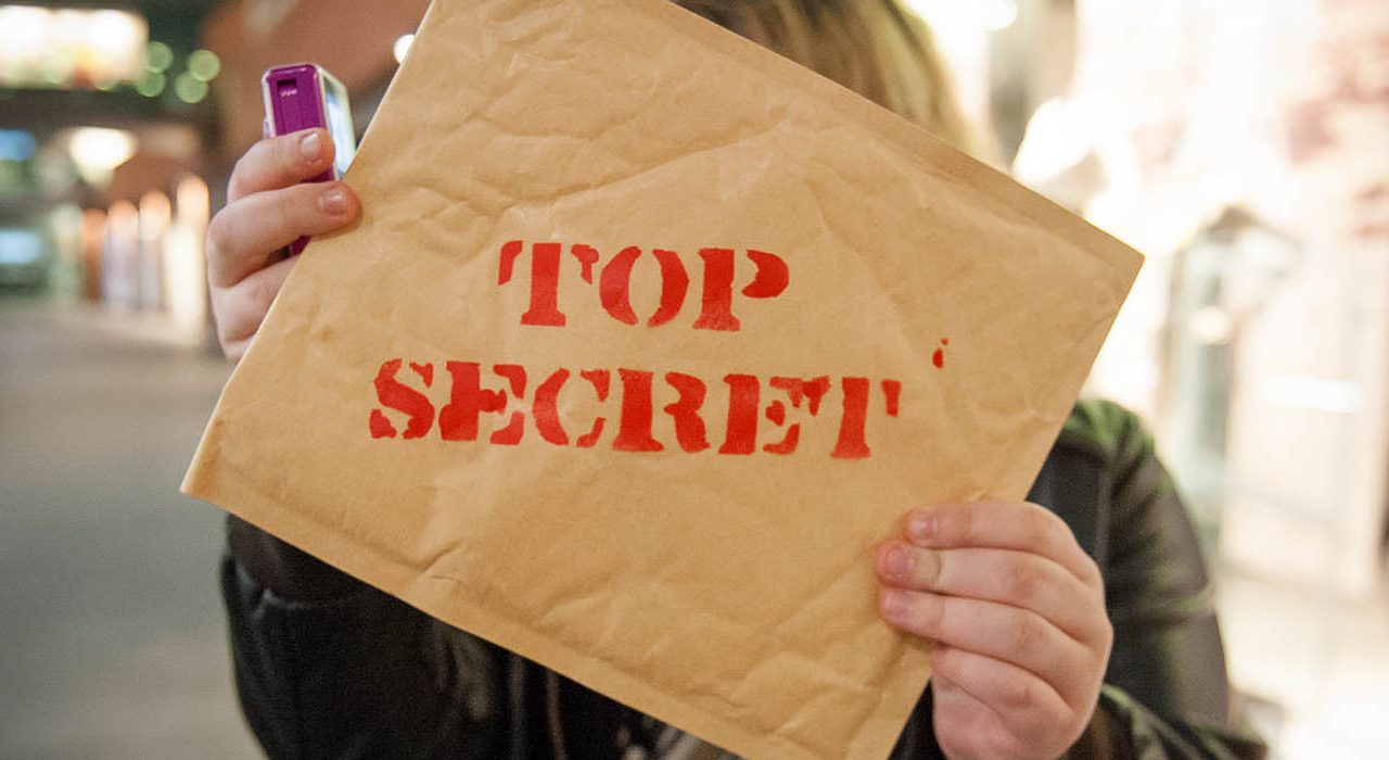 An envelope that says 'top secret on it'