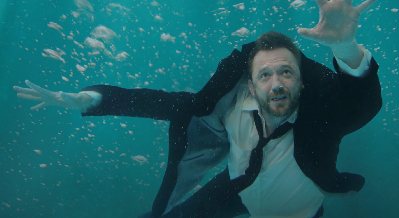 A man in a suit underwater