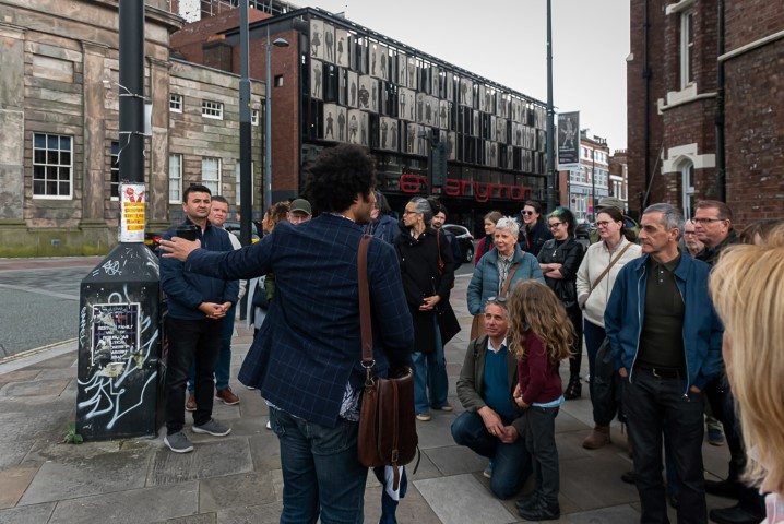 The walking tour in front of the everyman theatre